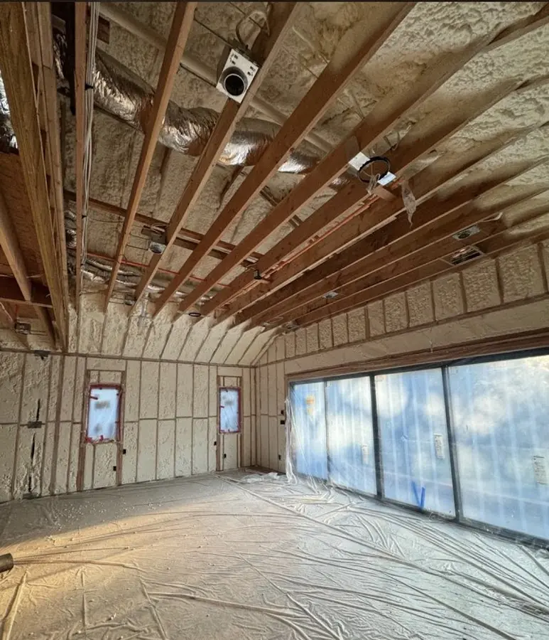 Interior walls and ceiling insulated with spray foam during new construction in Prairie Ridge